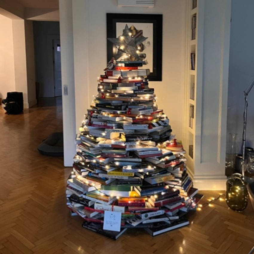 A Christmas tree made from books.
